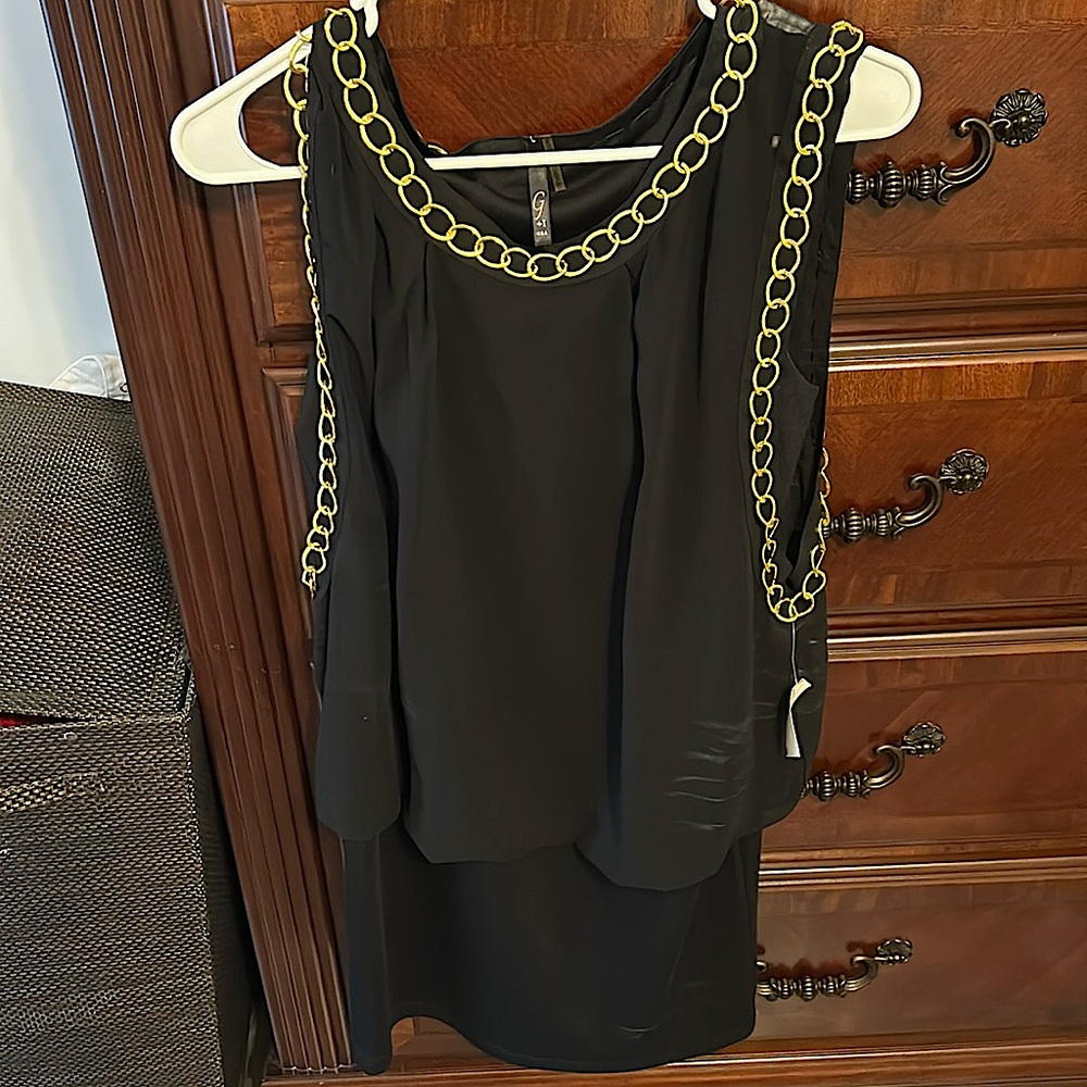 Black dress with gold chain link detail.   Never worn